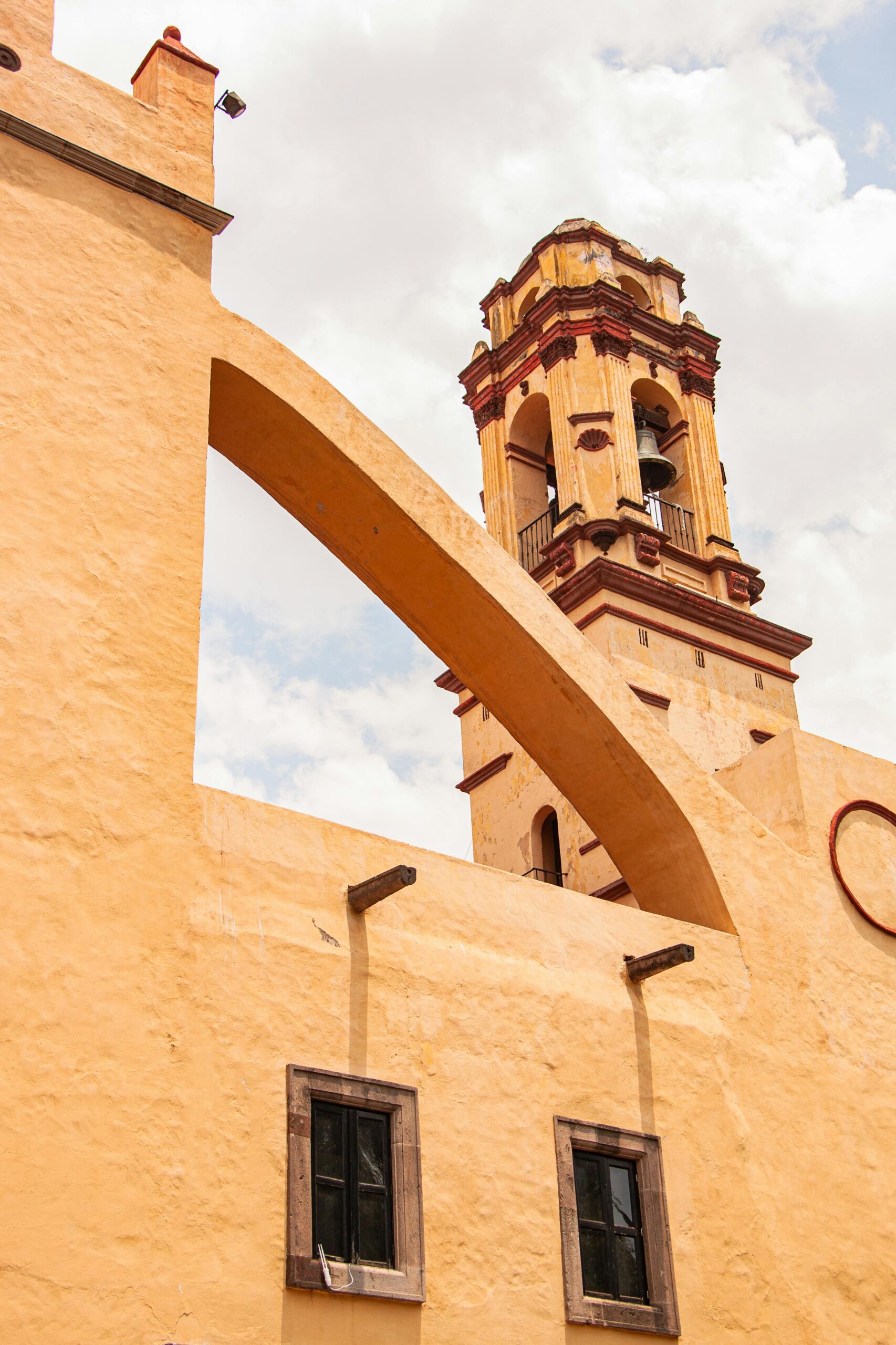 Vertical shot of San Bernardino de Siena Church's distinctive bell tower in Xochimilco.